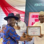 Rivers PDP Governorship Candidate, Victor Richard Evivna, Gets Certificate of Return from the party chairman. By Seyi Adeyemi.